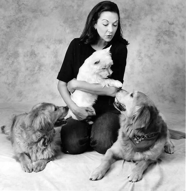 Lara from A Walk in the Park Pet Care with dogs and cats